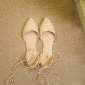Nude lace up flats