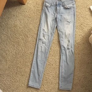 Light blue skinny ripped jeans and SIZE 0 REGULAR