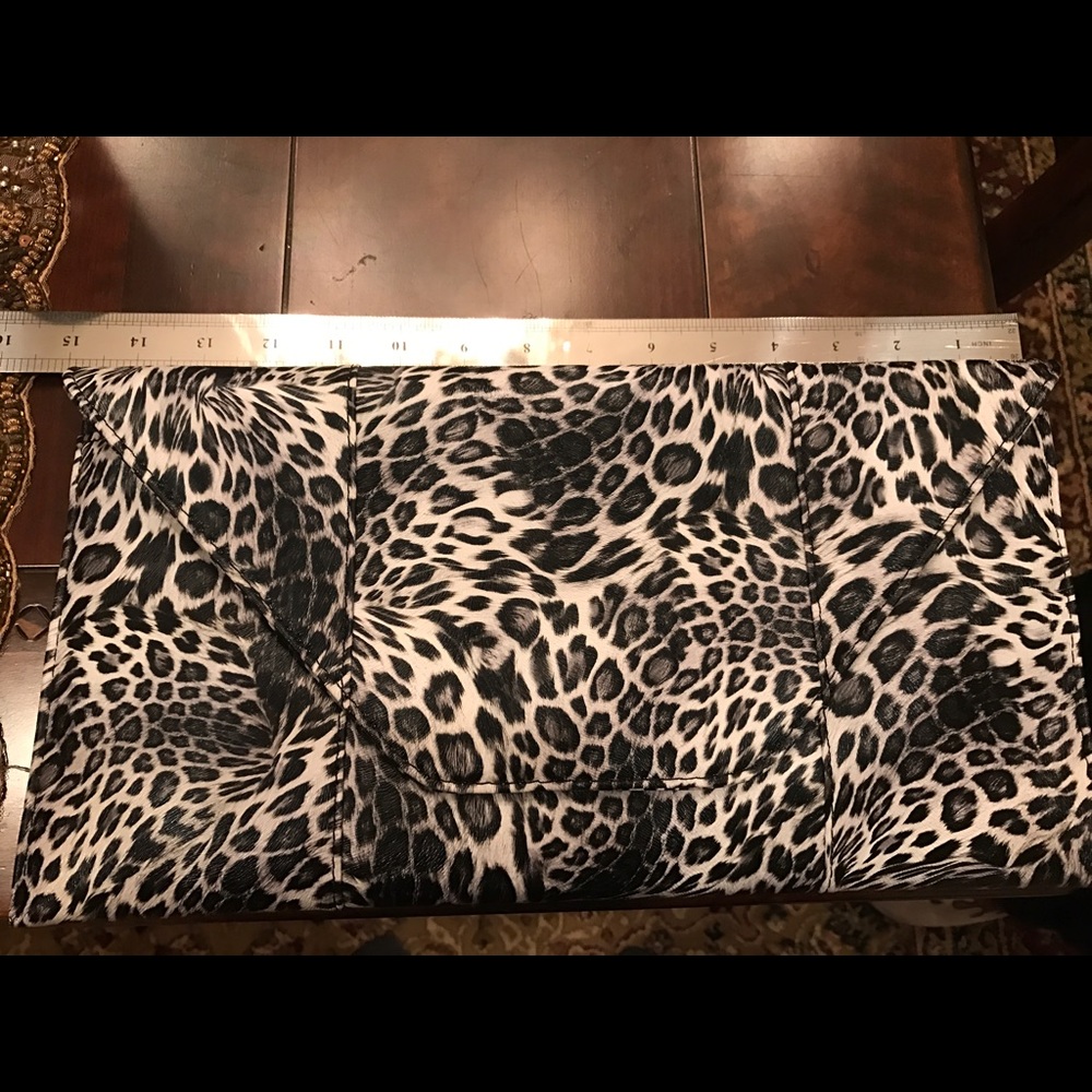 Fabulous animal print clutch with strap!!