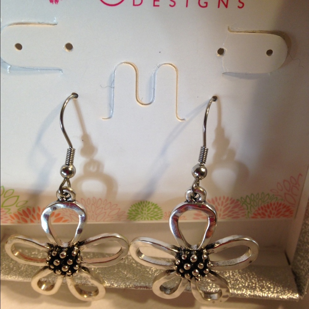 Sterling silver flower earrings. Never worn.