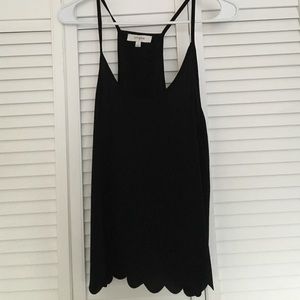 Scallop edge swing tank.