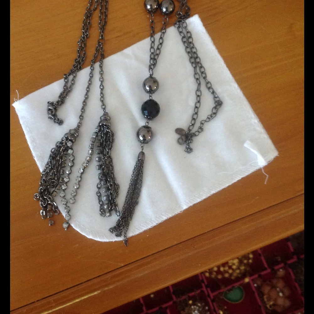 Set of gun metal necklaces.