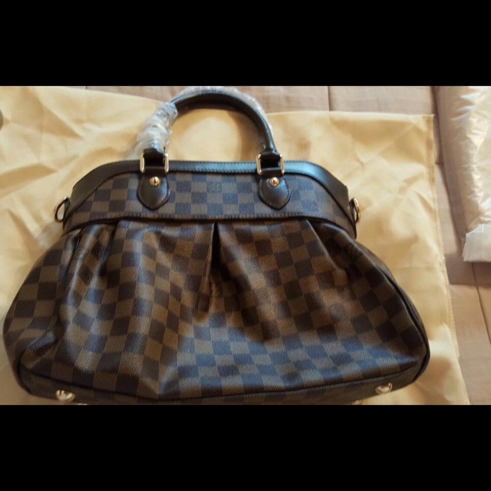 **SOLD**LV Mirror quality Trevi MM.