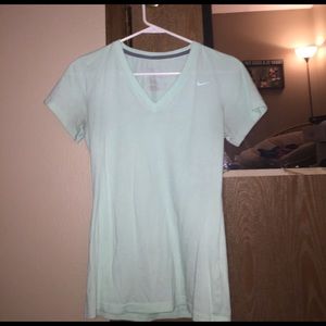 Mint green athletic tee.
