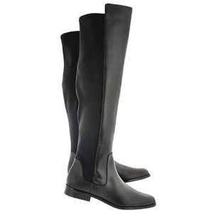 Knee high leather uppers and soft synthetic lining