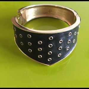 Black leather cuff.