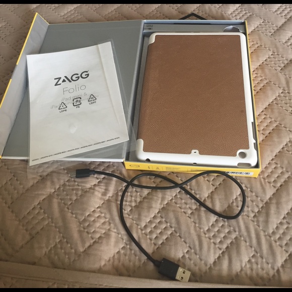 Zagg IPad mini keyboard case. Gold with white trim - Picture 2 of 4