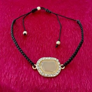 Black, gold and stone bracelet