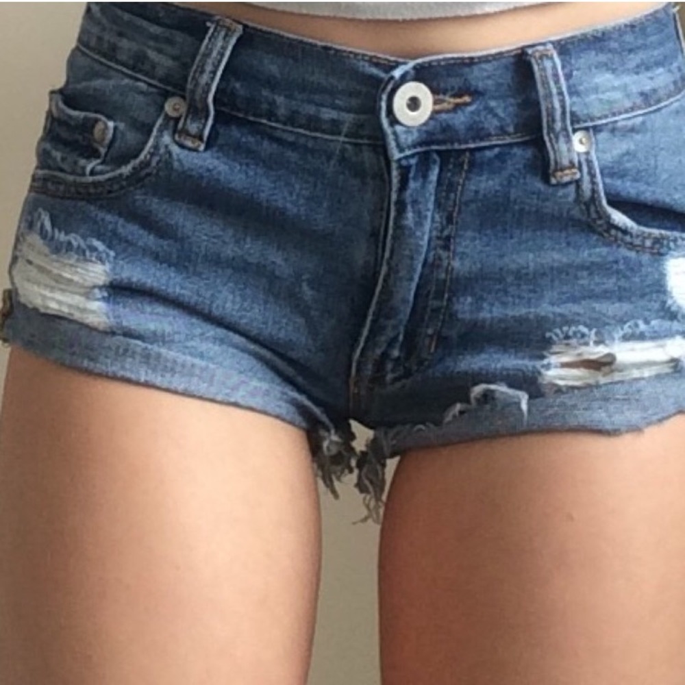 Low rise ripped denim shorts