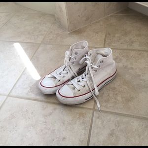 Gently worn white converse sneakers