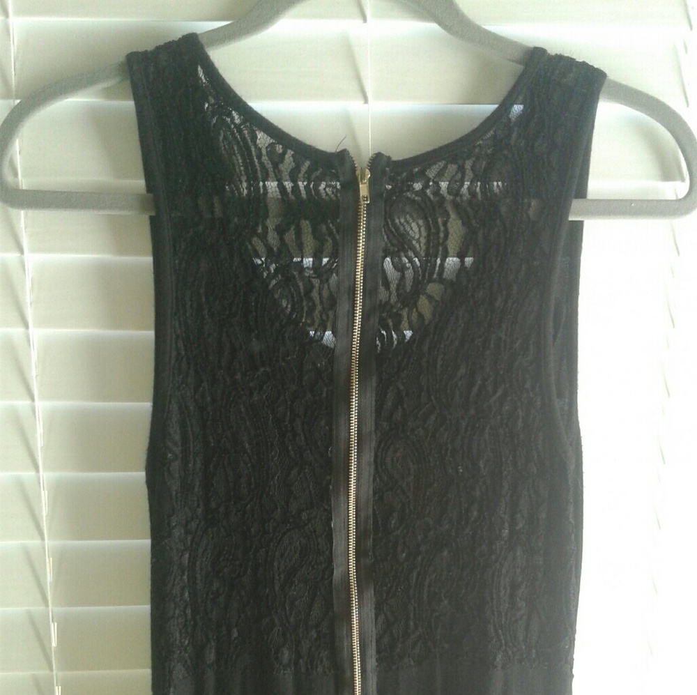 Cute LBD with lace back. Offers welcome.
