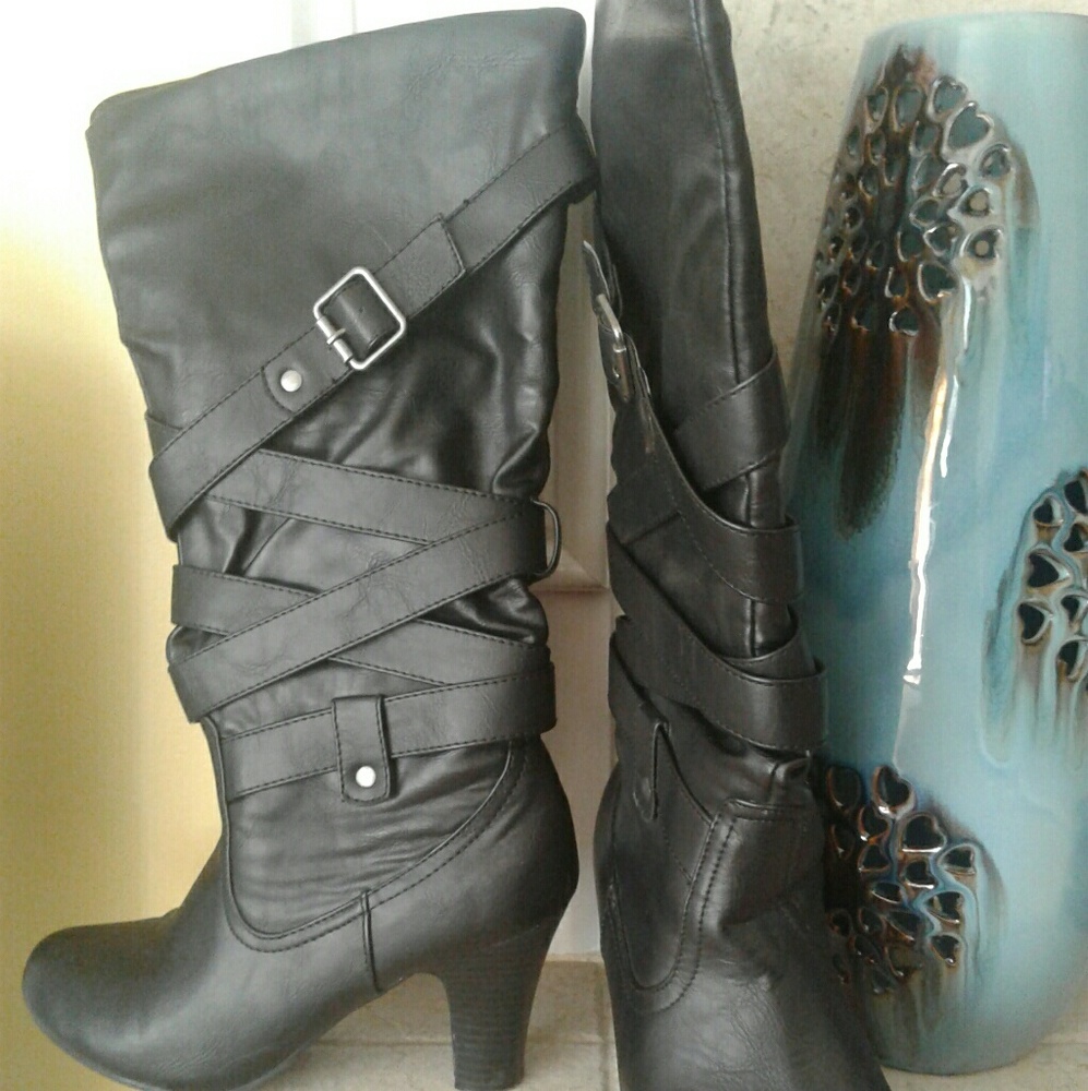 Xappeal  Black belted, below knee boots.