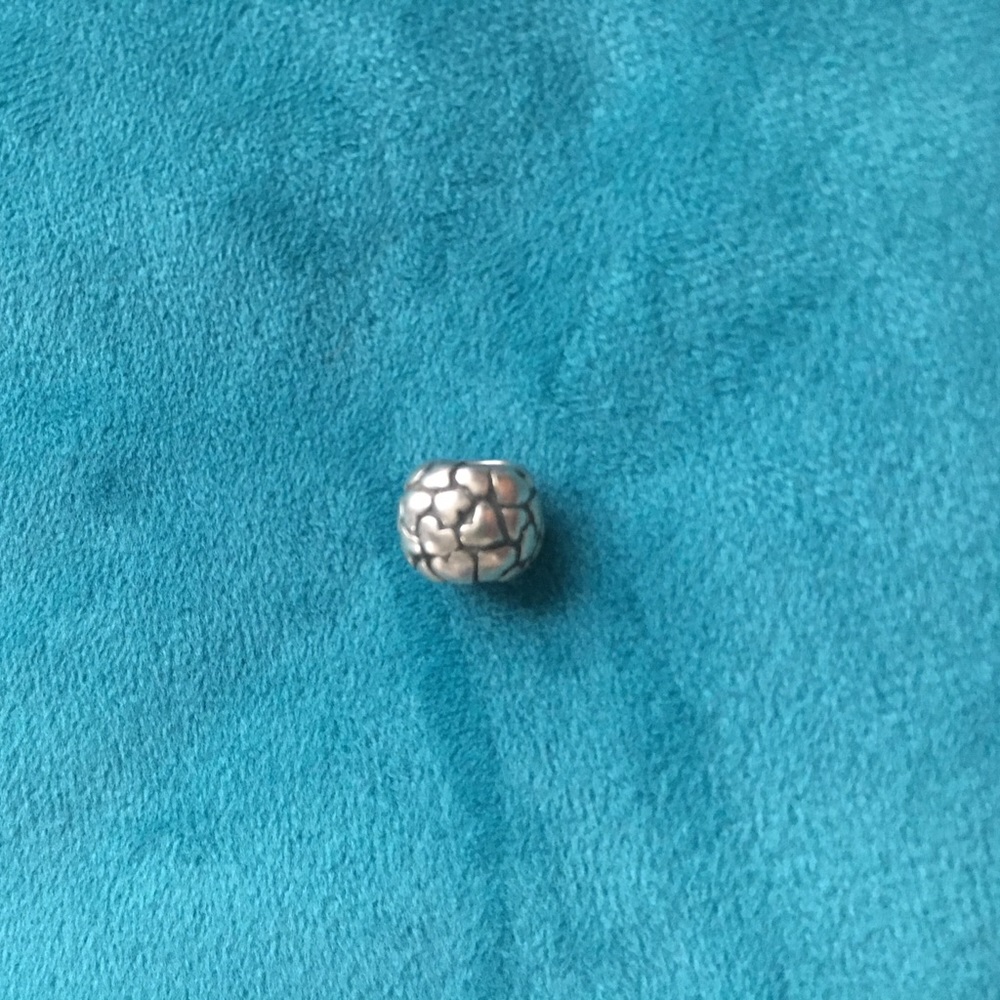 Authentic Pandora lots of hearts charm