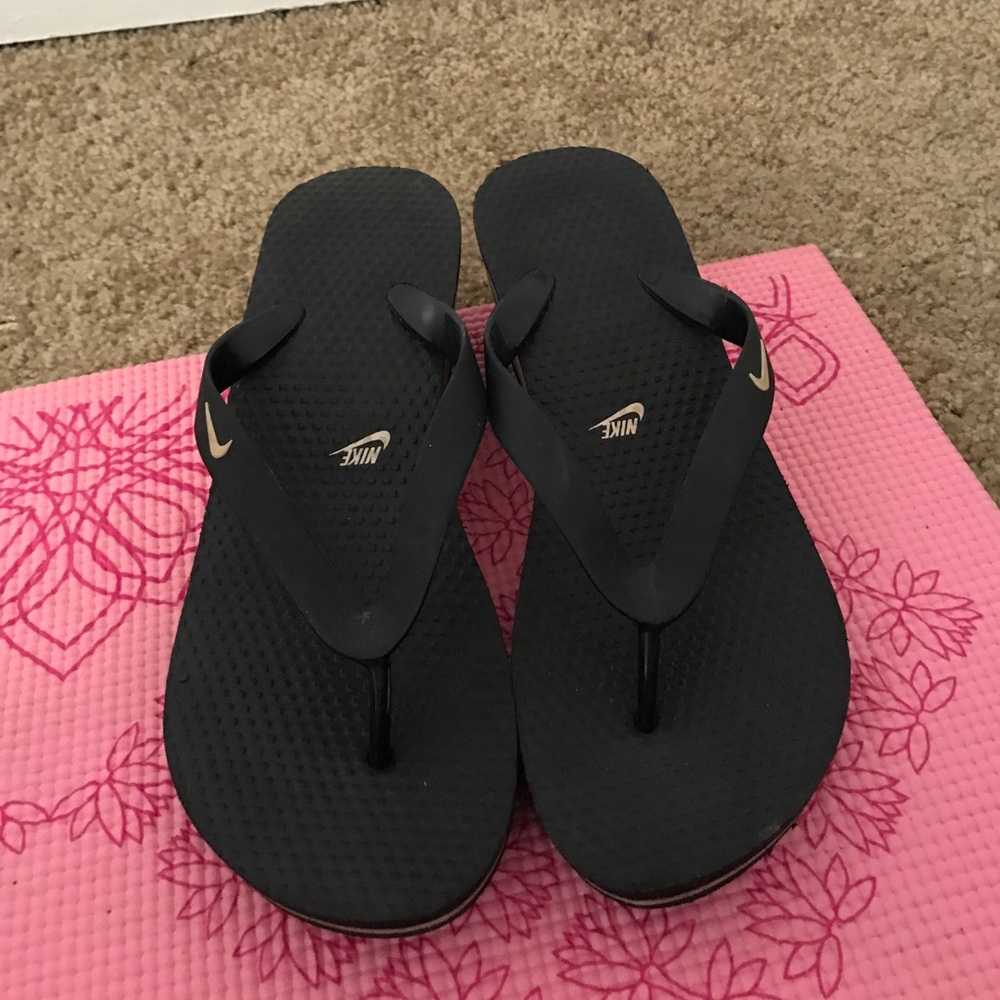 Brand new Nike flip flops