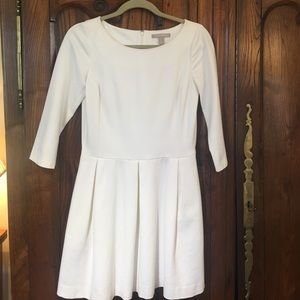 White flared long sleeve dress