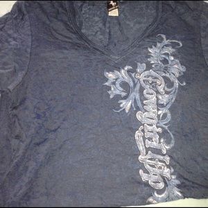 Super soft and cute burn out tee! Never worn.