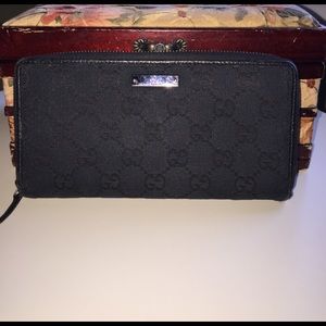 Gucci Monogram Canvas zip around wallet
