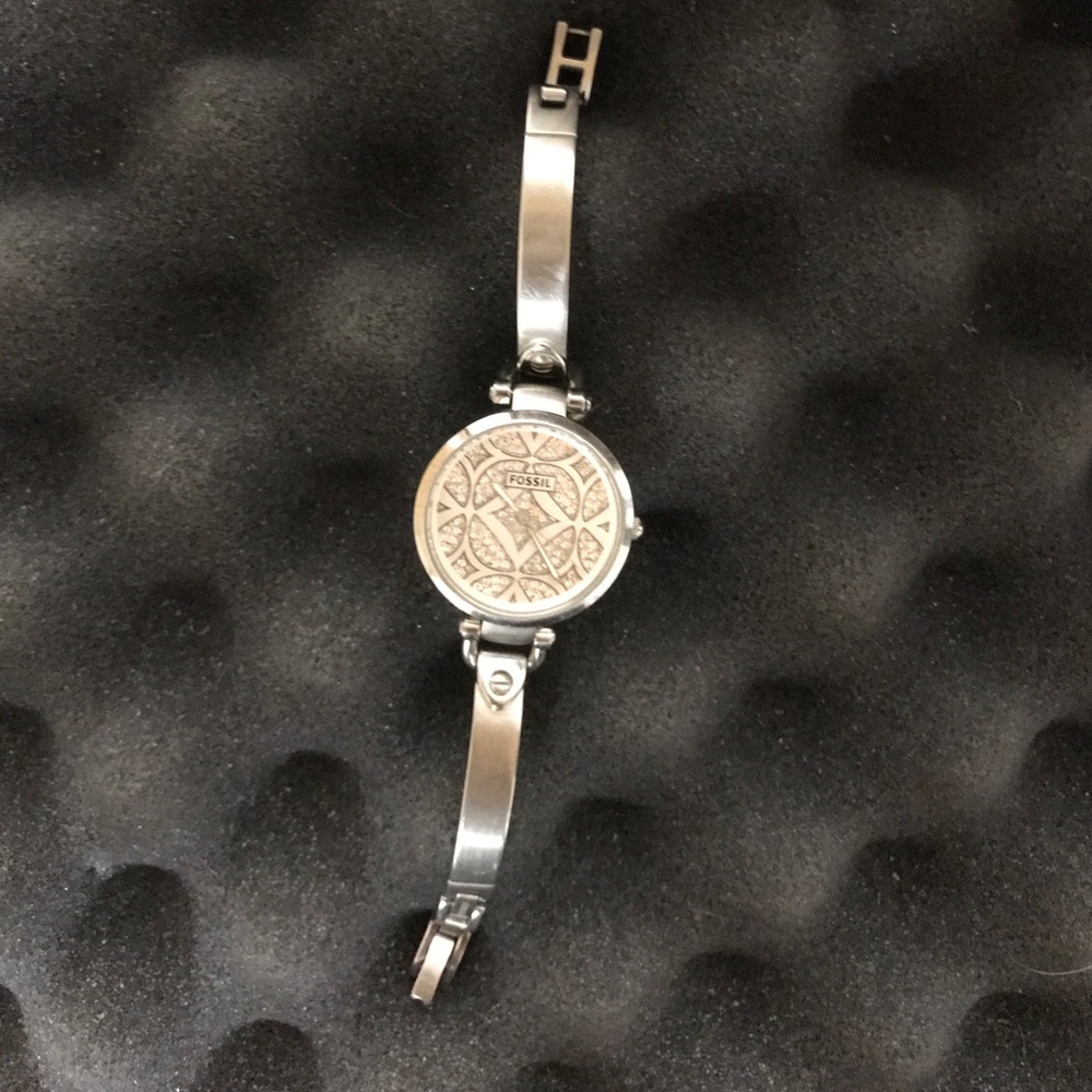 Fossil watch has scratch in middle though
