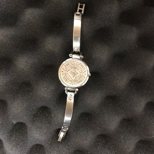 Fossil watch has scratch in middle though