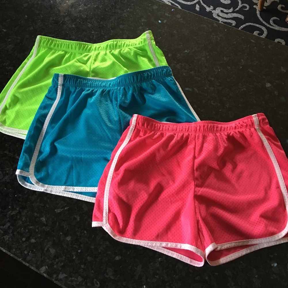 Three pairs of JUSTICE girls athletic shorts