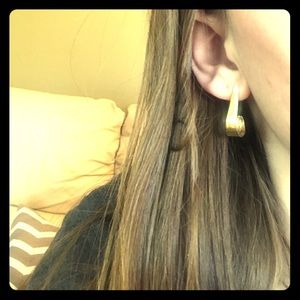 Gold curvy hanging earrings