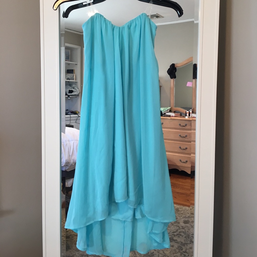 Strapless dress with cut out and tie in back