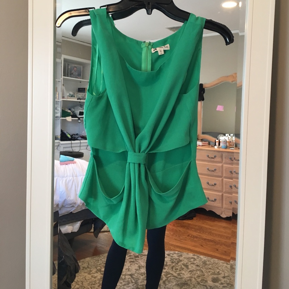 Sheer green blouse with knot in middle of front