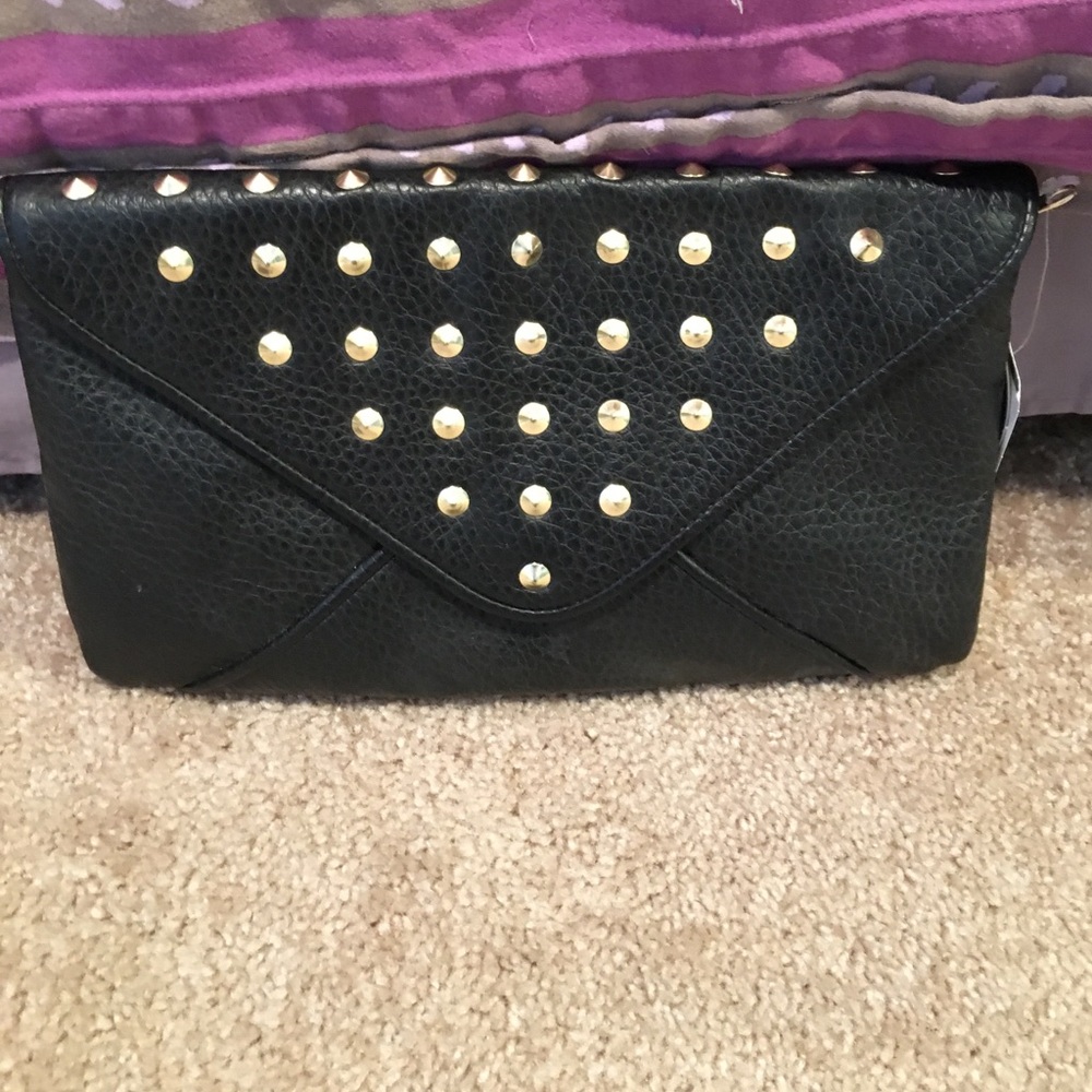 Black clutch with gold studs