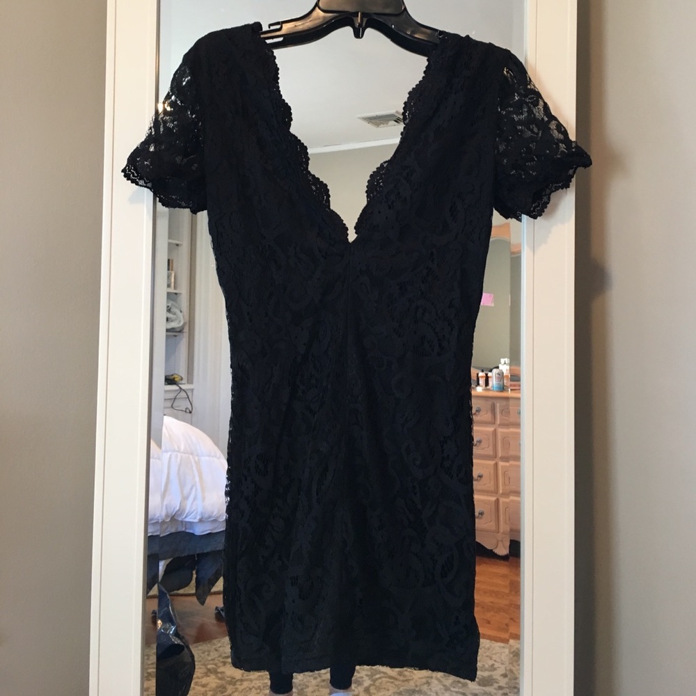 Black low cut (front and back) lace dress