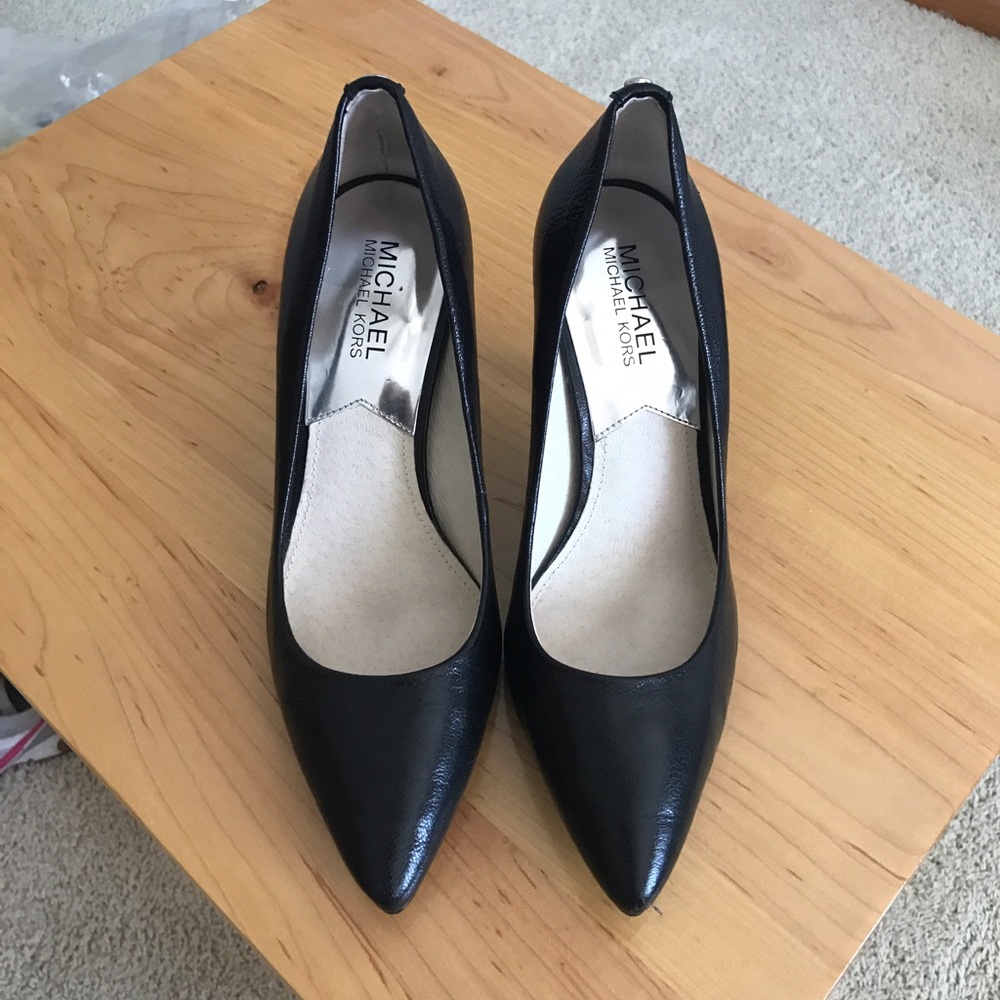 Michael Kors black pumps. Worn less than 5 times.