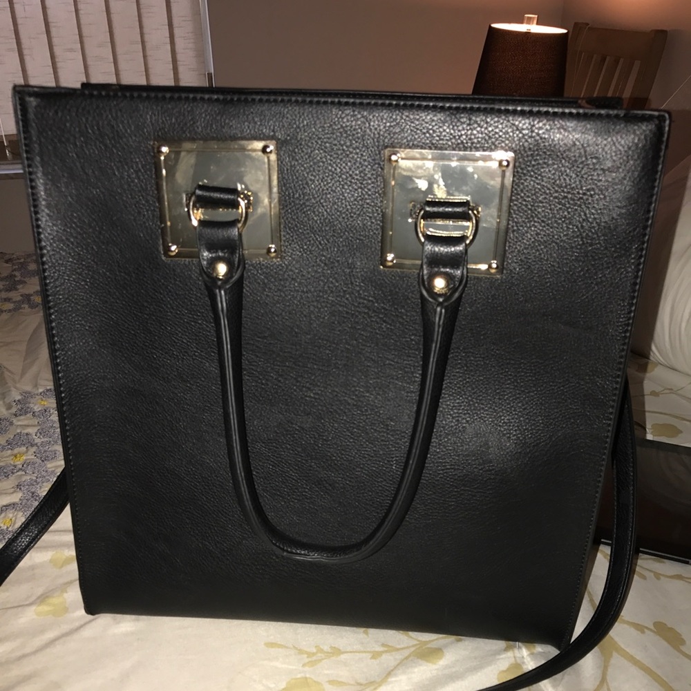 Like new uses once  black & gold tote bag