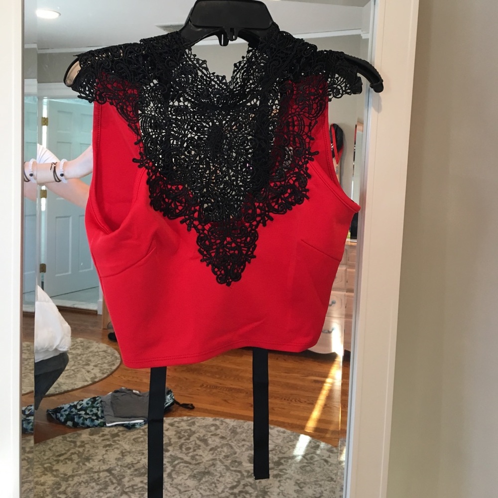 Red crop top with tie back and black pattern