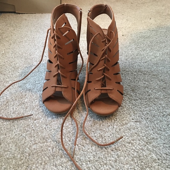 Francesca's Collections Shoes - NEVER WORN brown lace up heels. Size 6