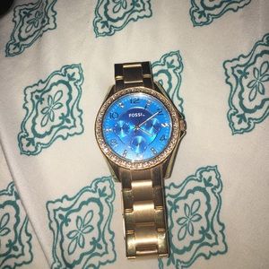 Gold fossil watch