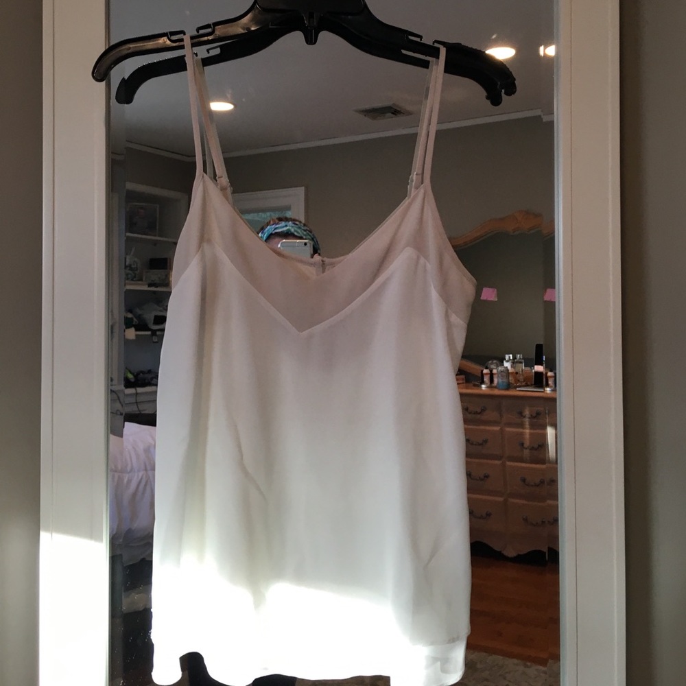 Sheer tank with buttons on back