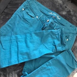Teal AE skinny jeans