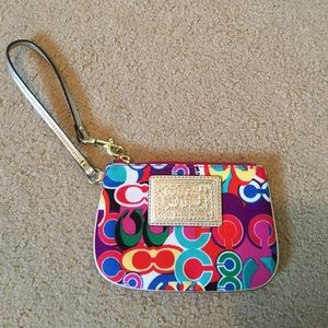 Multi colored coach wristlet
