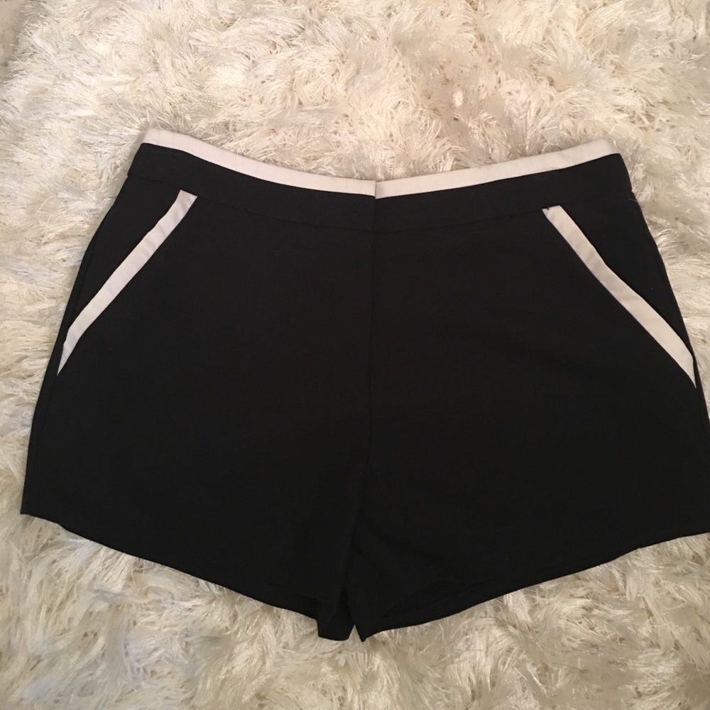 Black and white shorts ISSI brand
