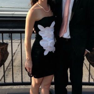 Black dress with white accent flowers