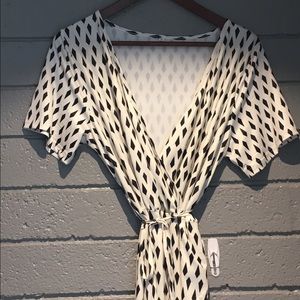 New w/out tags.  Classy mid calf wrap dress Size M