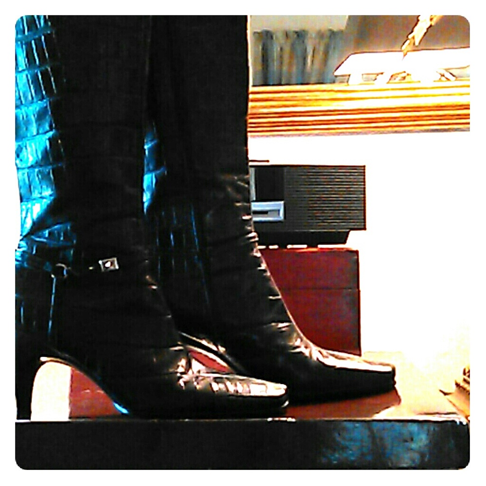Antonio Melani black leather boots.