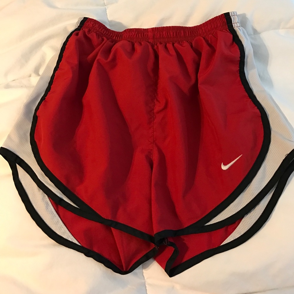 Red, black, and white nike shorts. Women's XS
