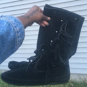Black moccasins with fringe and studs