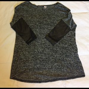 Knit top with faux leather sleeves
