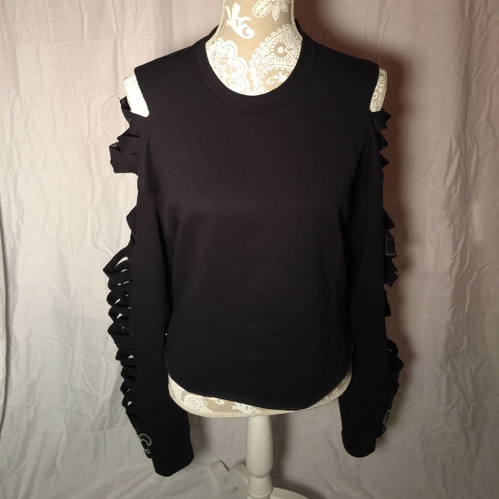 Shredded crop sweaters