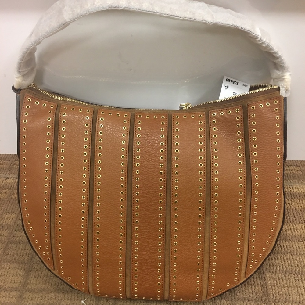 SOLD ✖️✖️✖️✖️✖️New authentic Michael KORS grommet