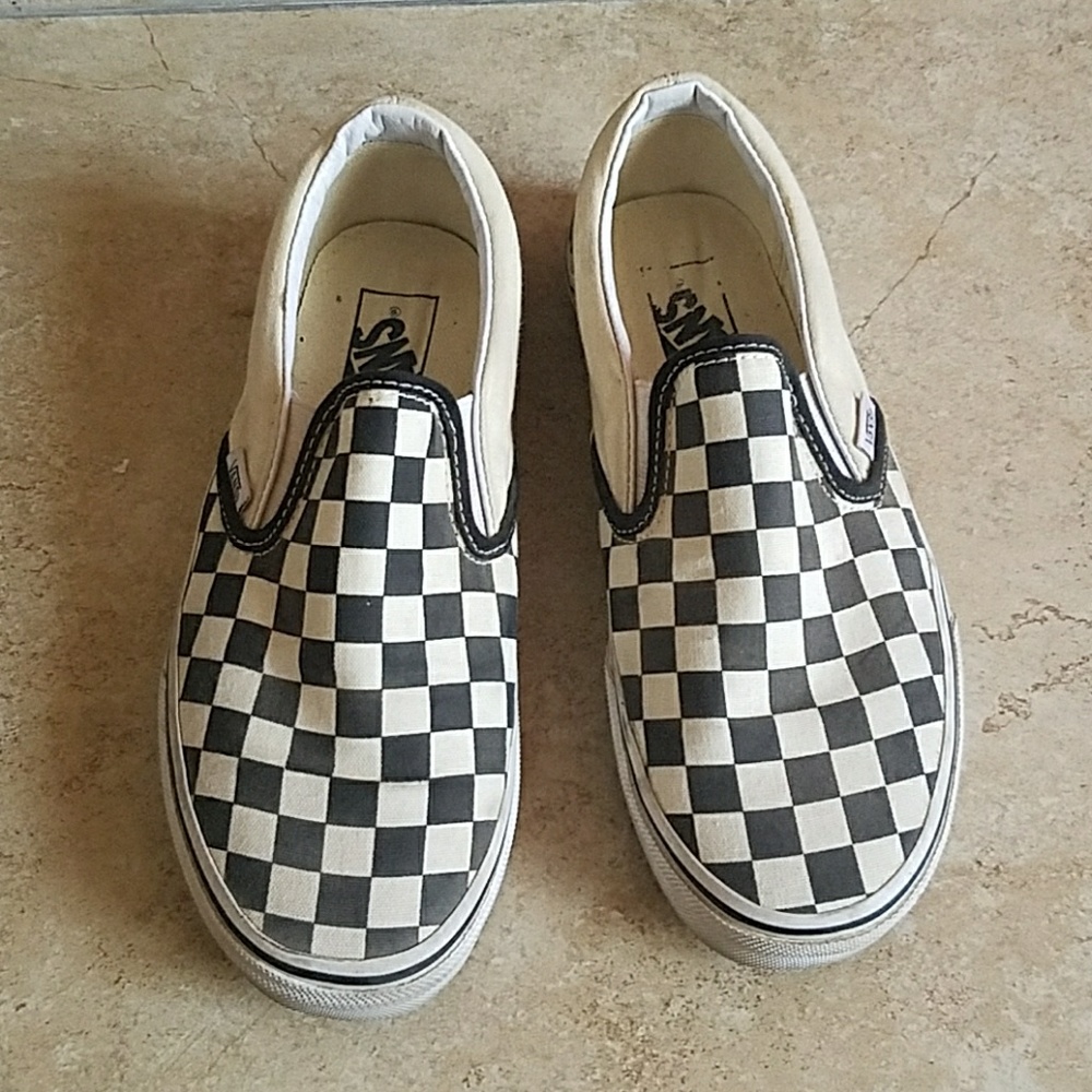 Black and white checkered slip on Vans