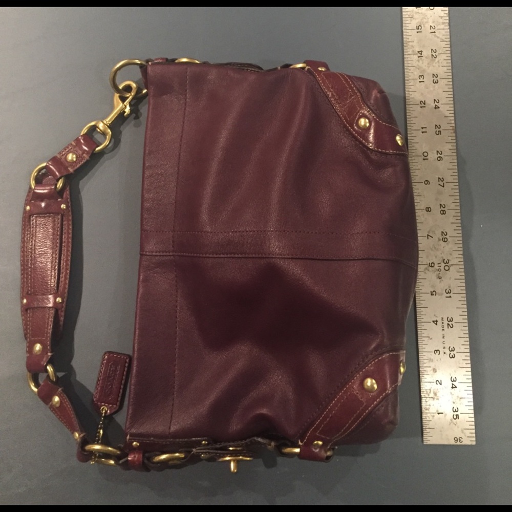 Purple/maroon leather Coach purse. Medium tote.