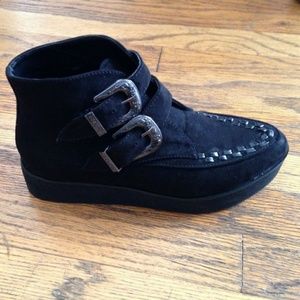 Black creeper buckle boots
