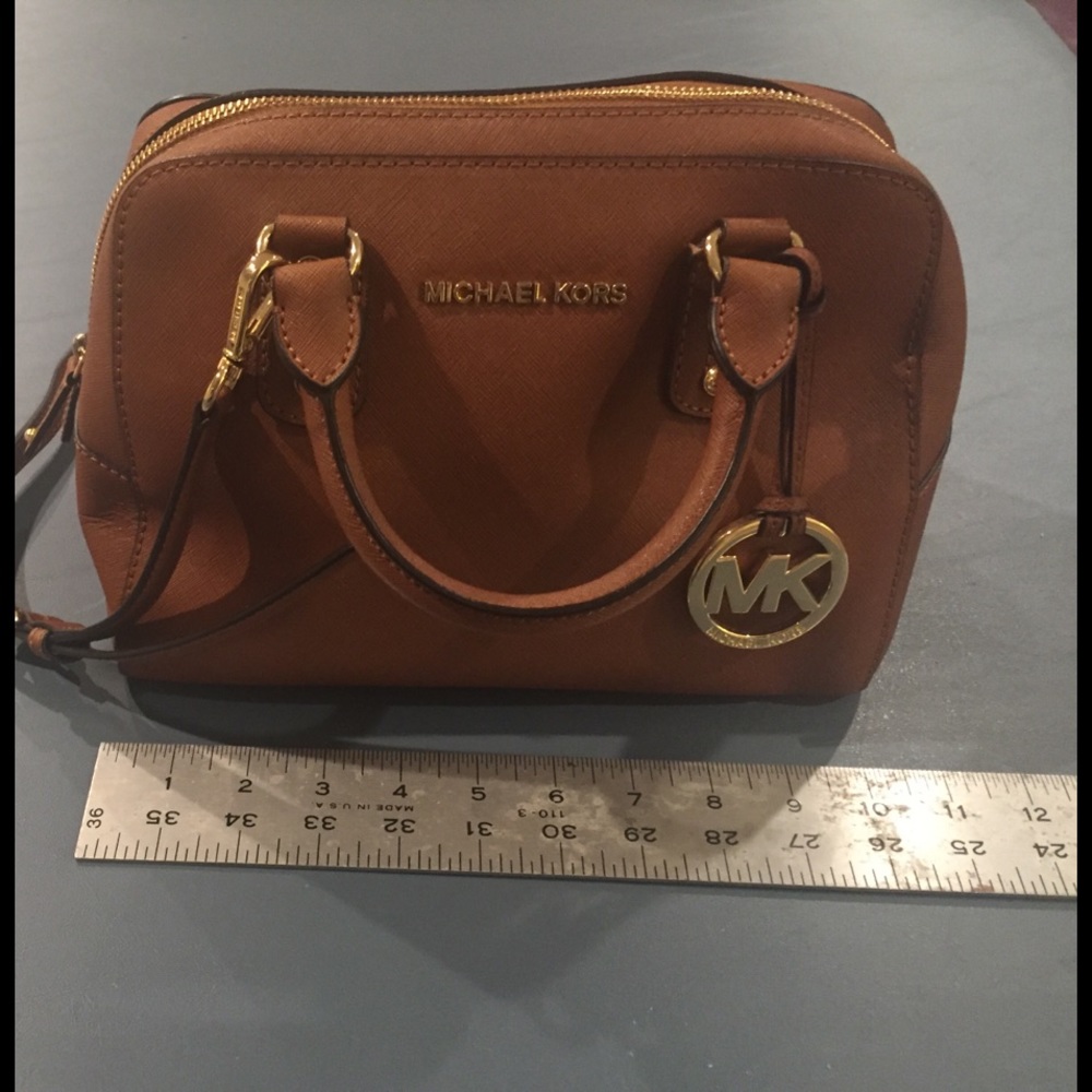 Never used Michael Kors light brown mini satchel.